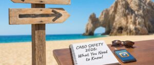 A paper on a beach table in Cabo reads Cabo safety 2026